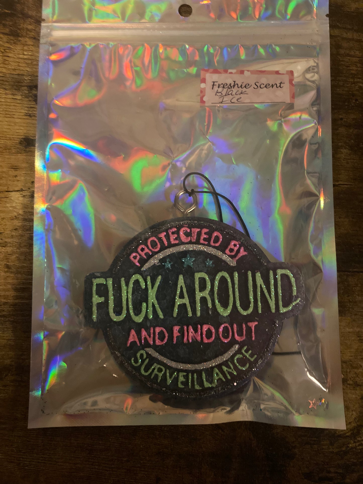 Car/Air Freshies Protected by Fuck Around and find out Surveillance Scent Black Ice painted glitter please email what colors you want