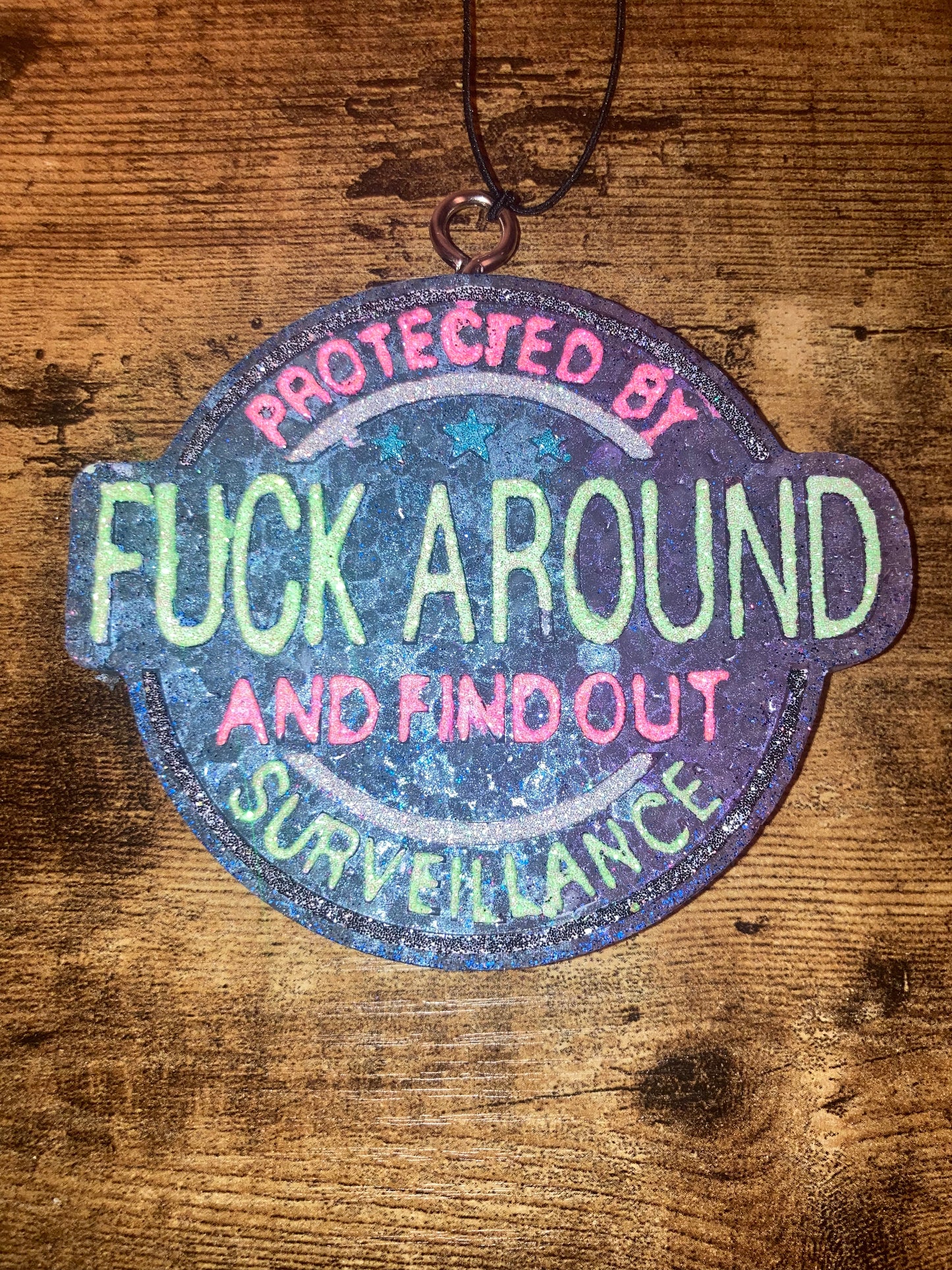 Car/Air Freshies Protected by Fuck Around and find out Surveillance Scent Black Ice painted glitter please email what colors you want