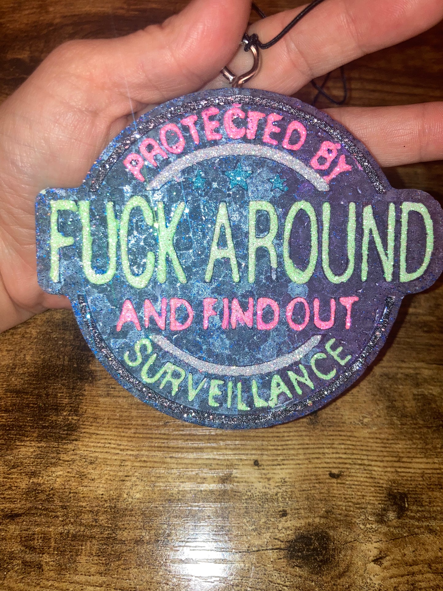 Car/Air Freshies Protected by Fuck Around and find out Surveillance Scent Black Ice painted glitter please email what colors you want