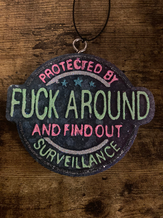 Car/Air Freshies Protected by Fuck Around and find out Surveillance Scent Black Ice painted glitter please email what colors you want