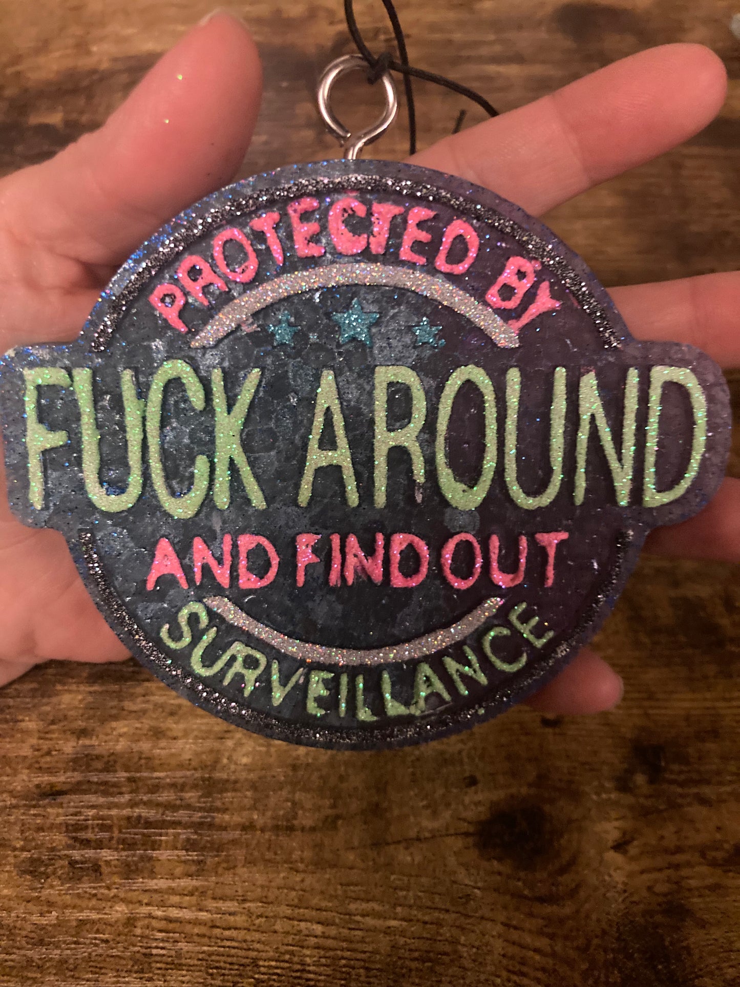 Car/Air Freshies Protected by Fuck Around and find out Surveillance Scent Black Ice painted glitter please email what colors you want