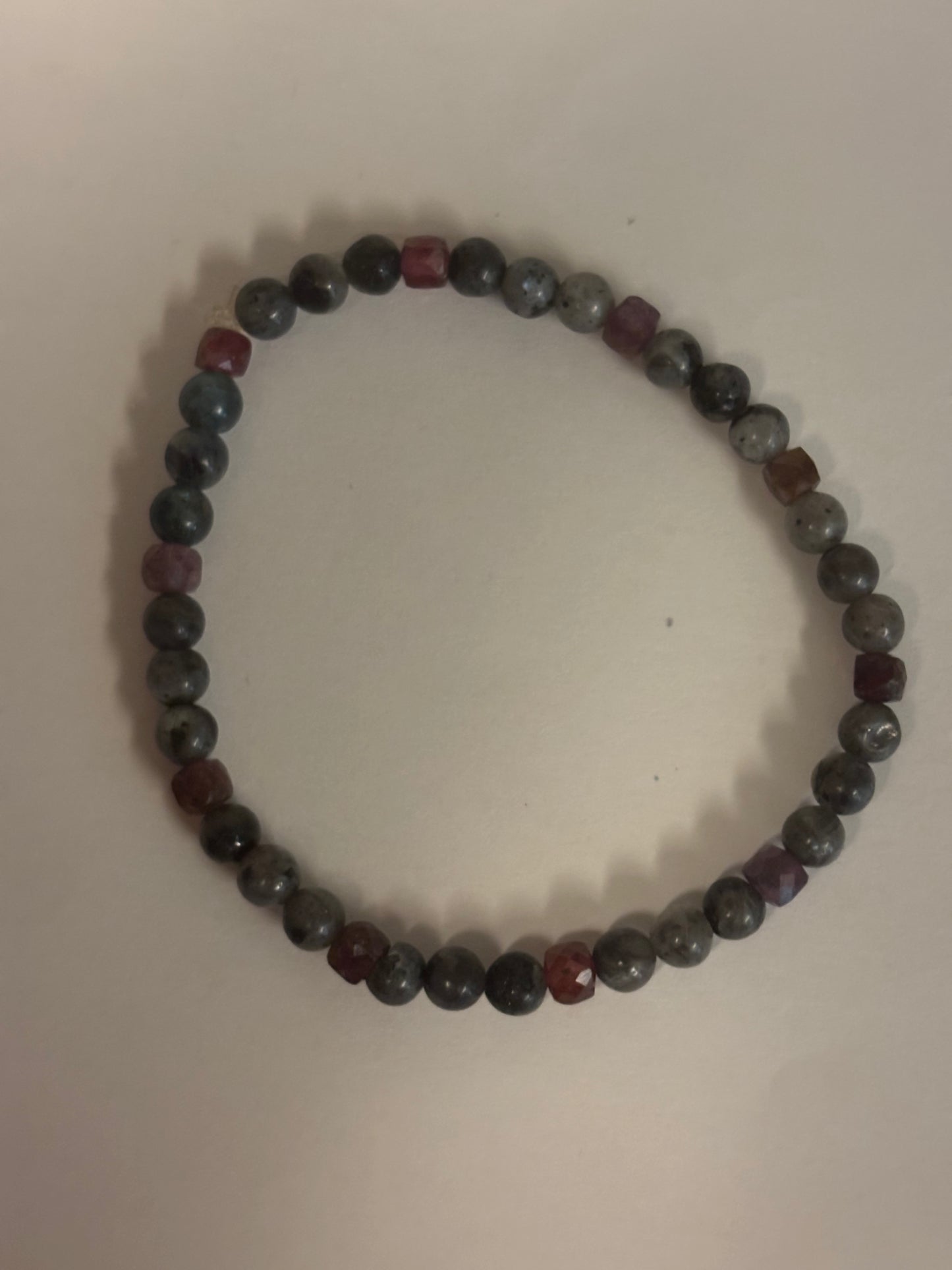 🔥 Soul Ignition – One-of-a-Kind Red Spinel & Labradorite Chakra Bracelet (4mm Beads)

Customize with Zodiac, Feather, or Moon Charm