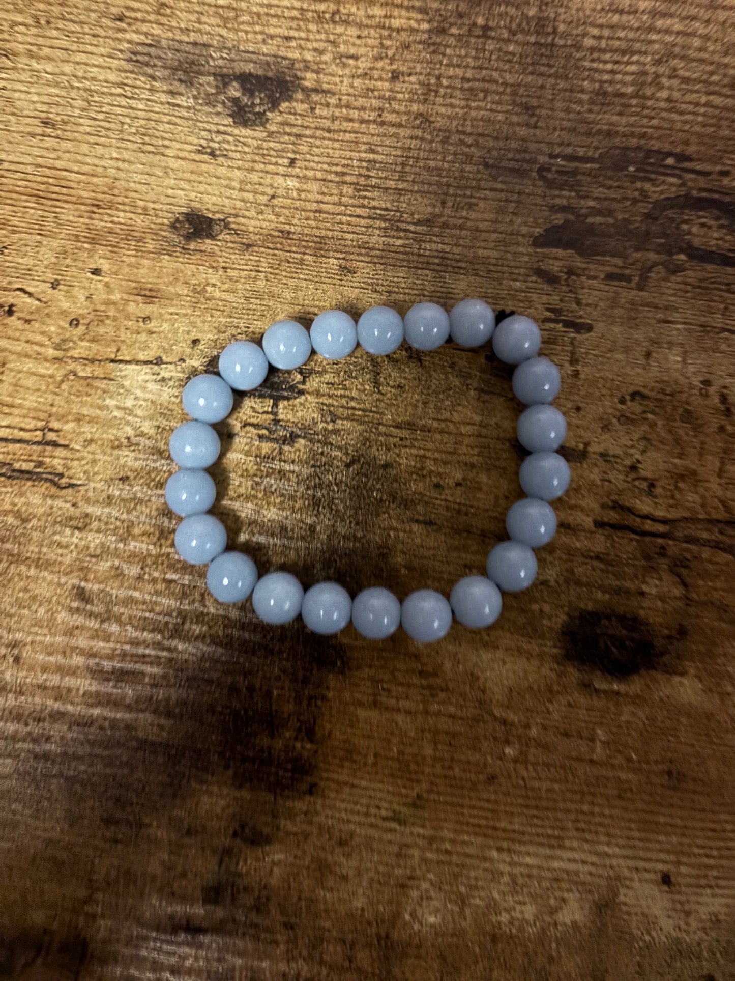 🌌 Celestial Calm – Angelite Crystal Bracelet (8mm Beads)

Peace • Intuition • Divine Connection