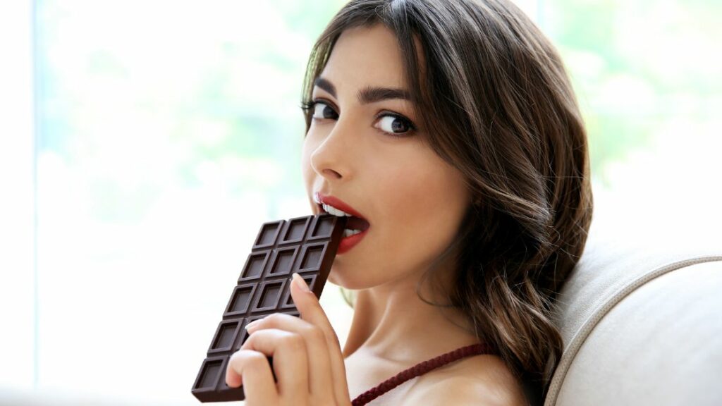 Sweets - girl eating chocolate
